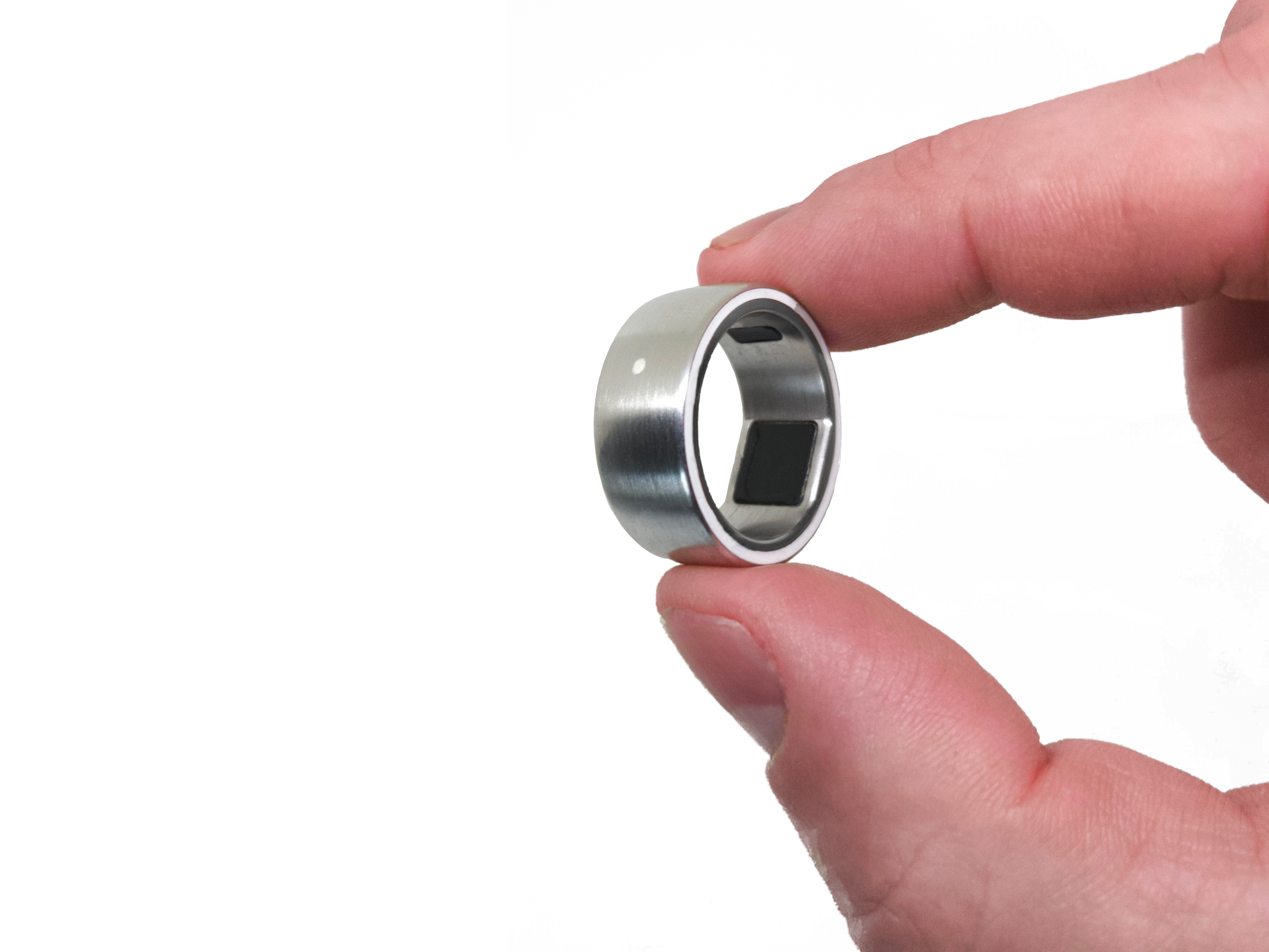 Closeup of Fingers Holding Ring